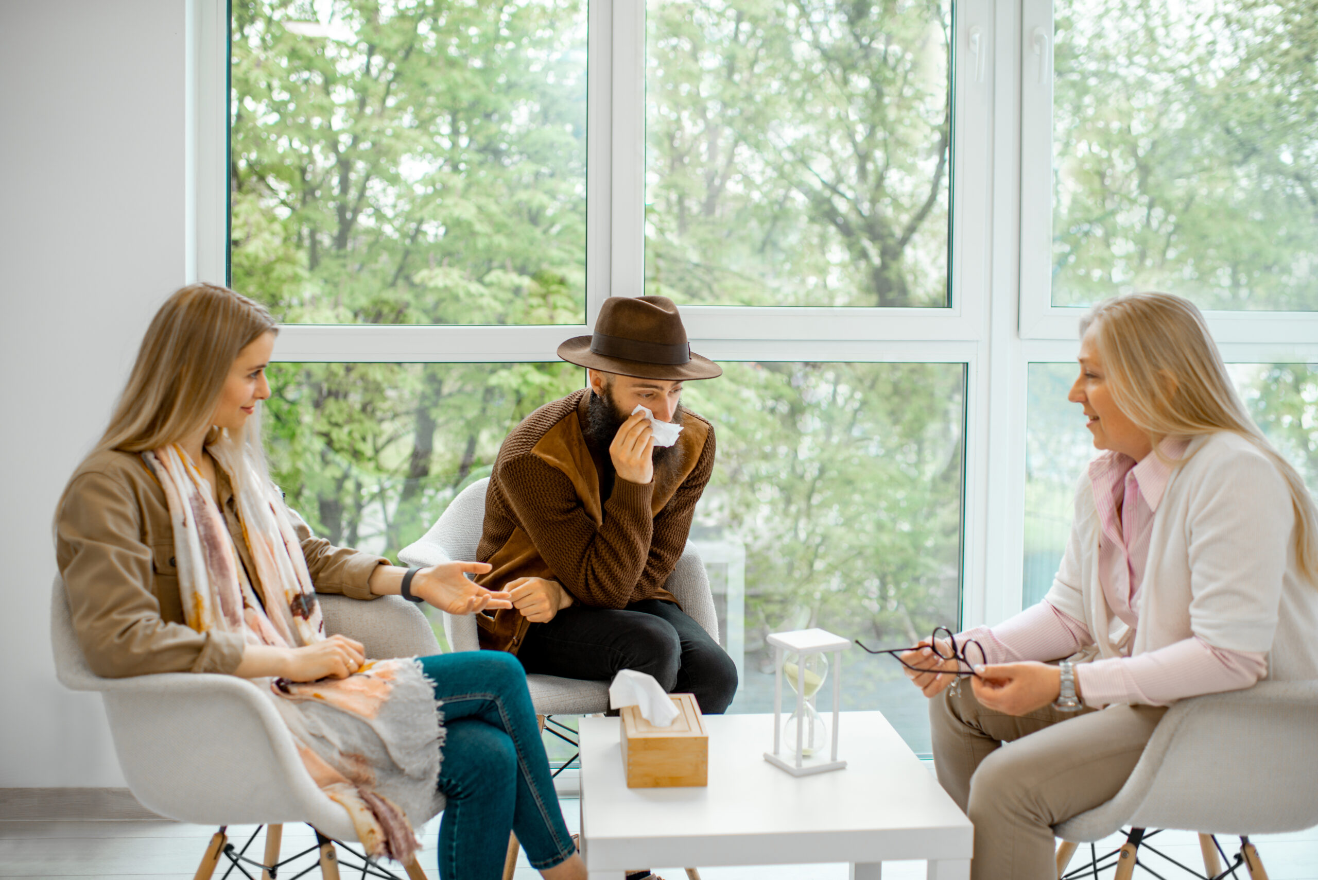 Couple with psychologist in the office